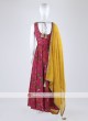Rani Color Anarkali Suit With Contrast Dupatta
