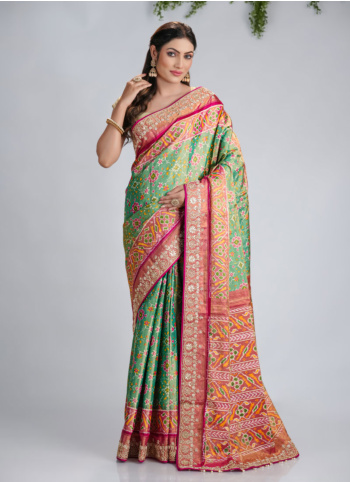 Pista Green And Rani Embroidered Silk Patola Saree