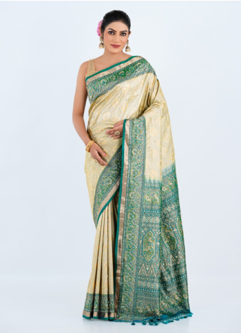Radiant Cream And Rama Banarasi Silk Saree