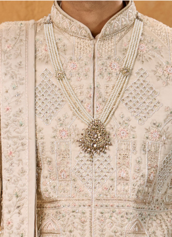 Luxurious Cream Art Silk Embroidered Sherwani Set 