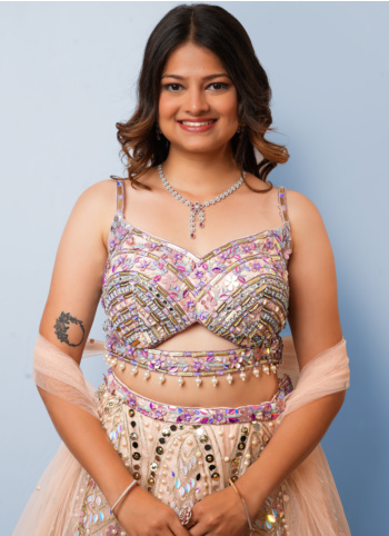 Peach And Multicolor Embroidered Net Lehenga Choli