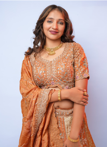 Rust And Cream Embroidered Silk Lehenga Choli