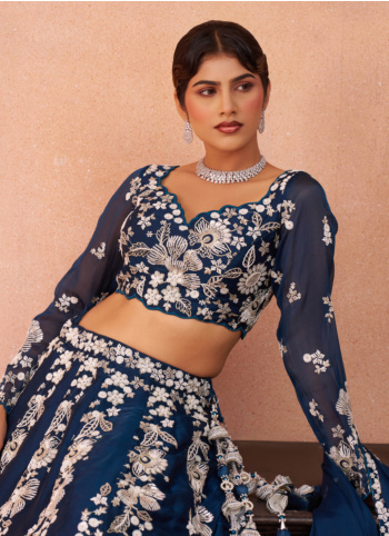 Shimmering Teal Embroidered Organza Lehenga Choli With Dupatta