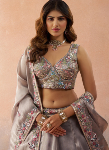 Attractive Lavender Tissue Silk Embroidered Lehenga Choli For Wedding