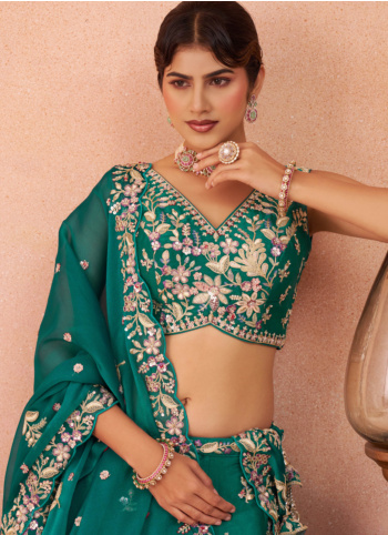 Shimmering Rama Color Embroidered Tissue Silk Lehenga Choli