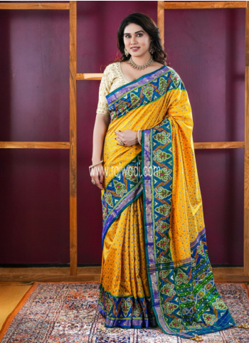 Yellow And Peacock Green Patola Silk Saree