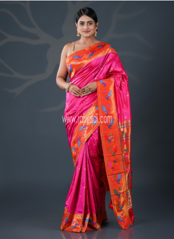 Rani And Orange Woven Banarasi Saree