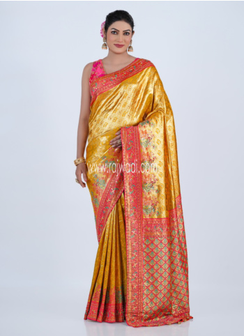 Yellow Banarasi Silk Saree with Pink Border