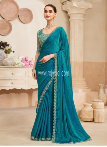 Shimmering Peacock Blue Organza Saree