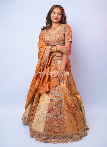 Rust And Cream Embroidered Silk Lehenga Choli