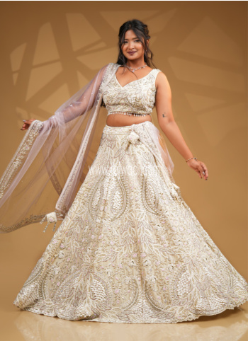 Ivory Silk Hand Embroidered Bridal Lehenga Set With Pink Net Dupatta