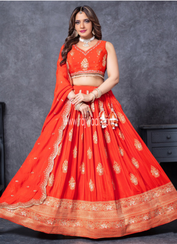 Beautiful Orange Woven Shimmer Silk Lehenga Choli With Dupatta