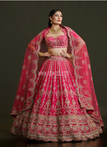 Deep Pink Hand Embroidered Raw Silk Lehenga Choli For Bride