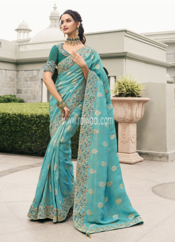Elegant Turquoise Zari Embroidered Tissue Silk Saree
