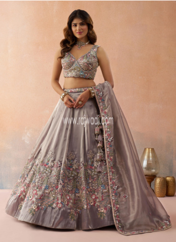 Attractive Lavender Tissue Silk Embroidered Lehenga Choli For Wedding