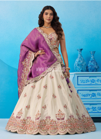 Glamorous Off White Embroidered Lehenga Choli With Contrast Purple Dupatta