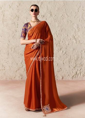Beautiful Rust Embroidered Border Organza Saree