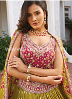 Parrot Green And Coral Pink Embroidered Lehenga Choli In Silk